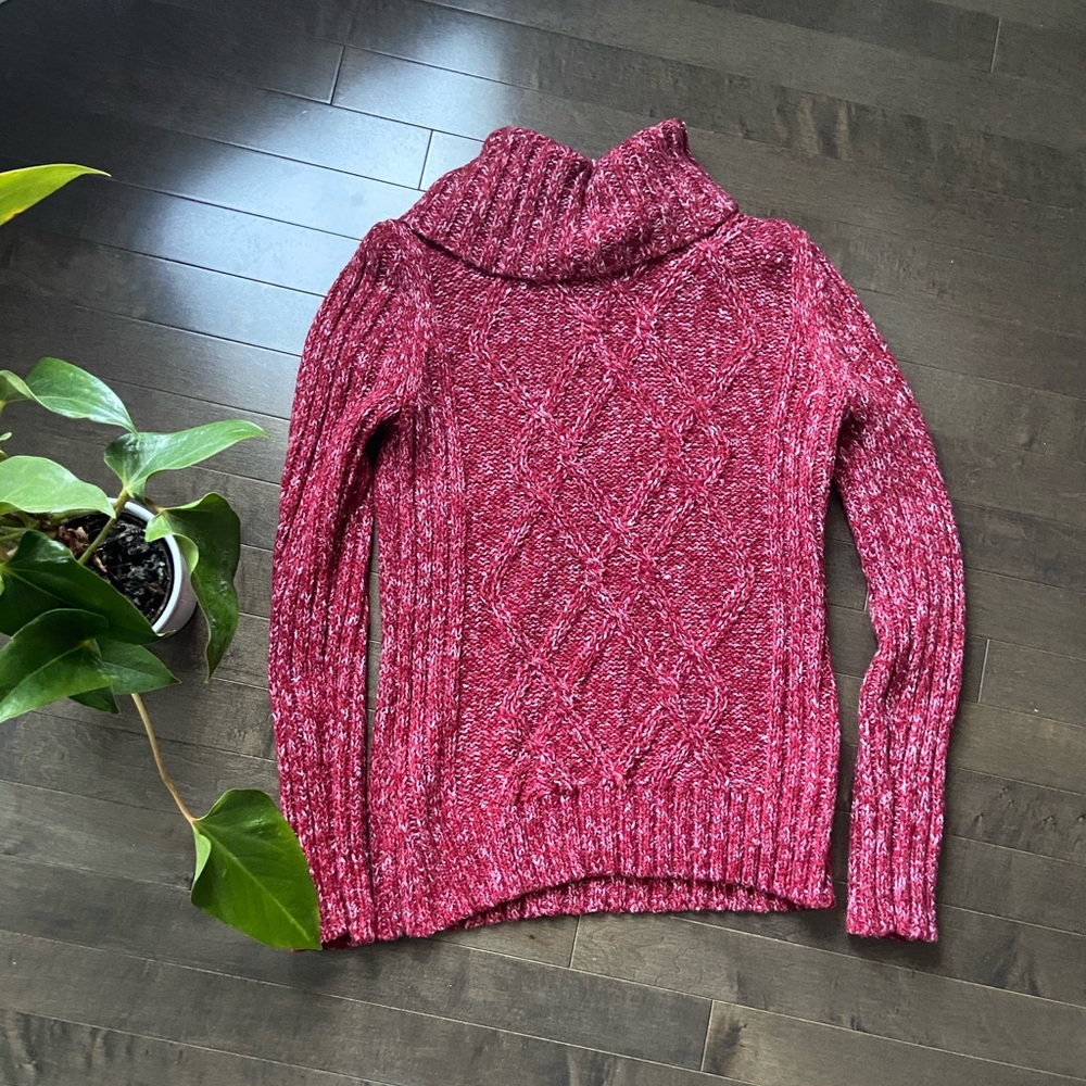 Red sweater with lighter stitch